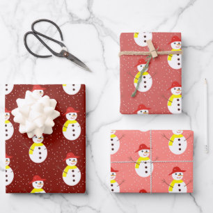 Cute snowman and snow on red wrapping paper sheet