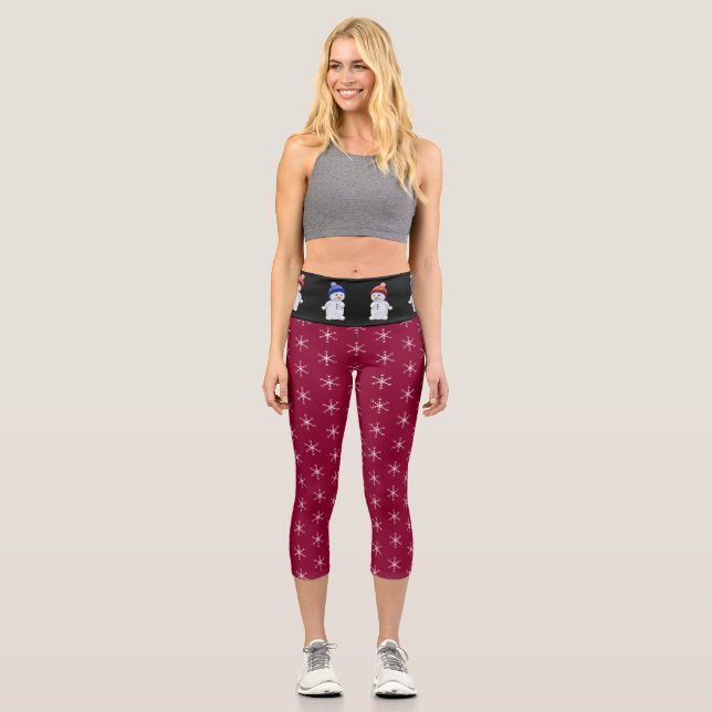 Cute snowman and snowflake pattern on burgundy capri leggings (Front)