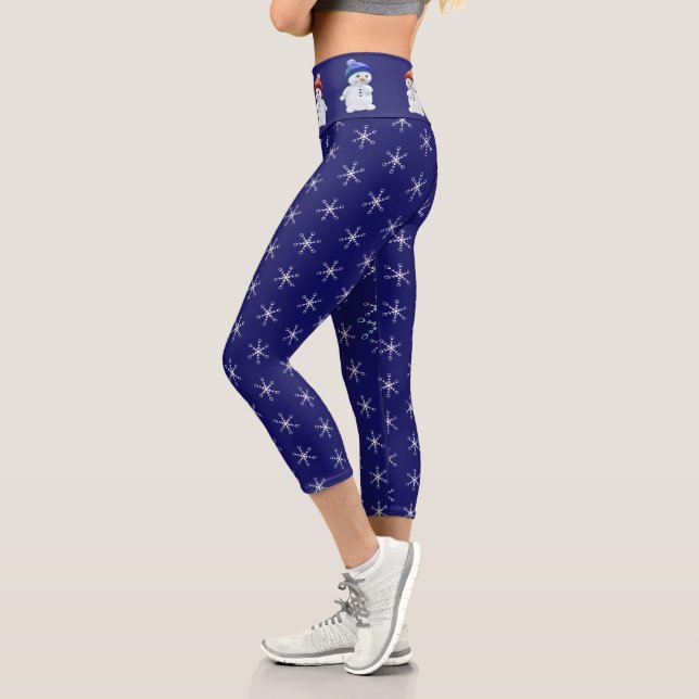 Cute snowman and snowflake pattern on navy blue capri leggings (Left)