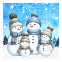 Cute snowman family in the snow