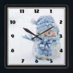 Cute Snowman in Winter Photograph Christmas Square Wall Clock<br><div class="desc">A clock with a cute photograph of a little snowman. Standing outside in the winter with snow falling all around. This cute little guy is dressed up in blue knitted hat and scarf.</div>