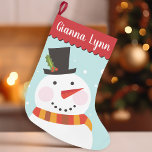 Cute Snowman Monogram Small Christmas Stocking<br><div class="desc">Celebrate the holiday season with this charming Christmas stocking that features an illustration of a snowman wearing a top hat adorned with holly leaves and berries. The snowman, complete with a carrot nose, cosy winter scarf, and delicate snowflakes, is framed by a trendy scalloped edge border. This design will add...</div>