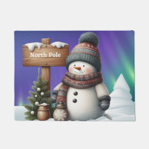 Cute snowman on North Pole with northern lights Doormat
