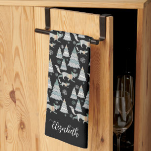 Cute snowy forest and charming foxes tea towel