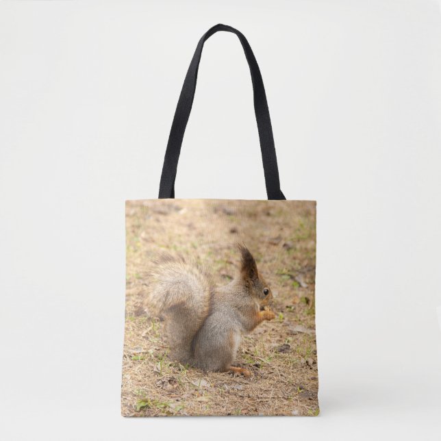 Cute squirrel eats a nut photo tote bag (Front)