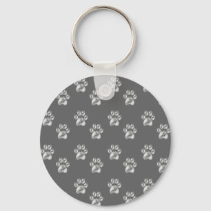 Cute stylish paw pattern on dark grey key ring