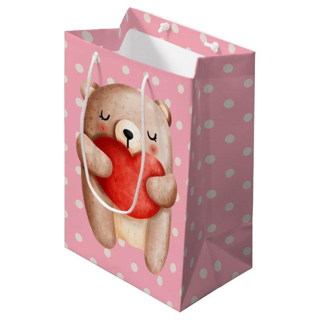 Cute Teddy Bear Carrying a Red Heart Medium Gift Bag (Front Angled)