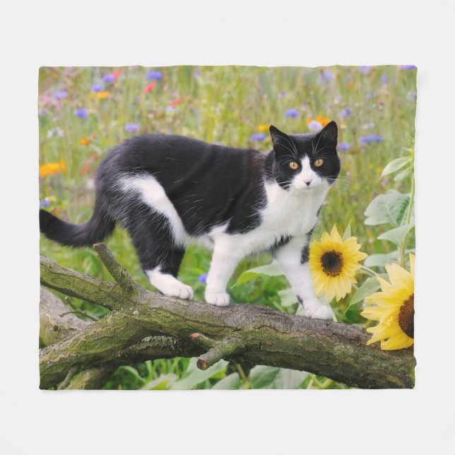 Cute tuxedo cat on a tree branch with sunflowers _ fleece blanket (Front (Horizontal))