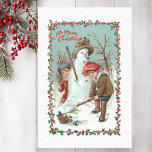 Cute Vintage Children and Snowman Tissue Paper<br><div class="desc">Two Victorian children building a snowman with Merry Christmas text and festive holly border.</div>