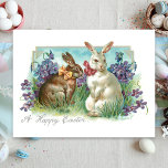 Cute Vintage Easter Bunnies with Bows Postcard<br><div class="desc">Cute whimsical vintage Easter bunnies wearing neck bows sitting in the grass with purple forget-me-nots and A Happy Easter message in silver.</div>