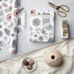 Cute Watercolor Christmas Stocking Doodles Wrapping Paper<br><div class="desc">This artistic Christmas gift wrapping paper features, hand-painted watercolor illustrations of festive stockings, twinkling stars, whimsical florals, and whimsical candy canes. The soft colour palette of blush pinks, and gentle greys on white, adds an elegant, dreamy touch to your holiday presents. Perfect for wrapping gifts with a cosy handmade drawn...</div>