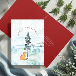 Cute Watercolor Fox Illustration Christmas Card<br><div class="desc">This charming woodland holiday card showcases a delightful watercolor fox nestled under a pine tree in a snow-covered field. The words "Merry Christmas" are elegantly arched over the scene in classic typography. Inside, a rich red colour provides the backdrop for your personalised greeting in white. Customise the text to suit...</div>