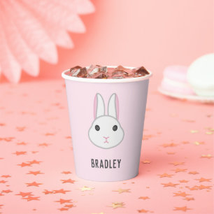 Cute white bunny on pink paper cups