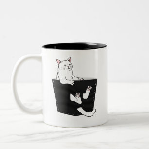 Cute White Cat Sits in Pocket Two-Tone Coffee Mug