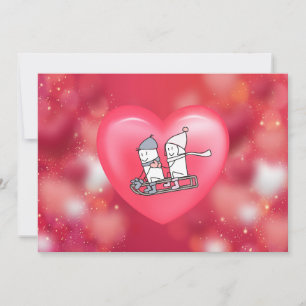 Cute Winter Couple on Sled Heart Holiday Card