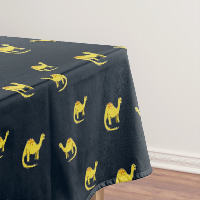 Cute yellow dinosaurs pattern on blue tablecloth (In Situ)