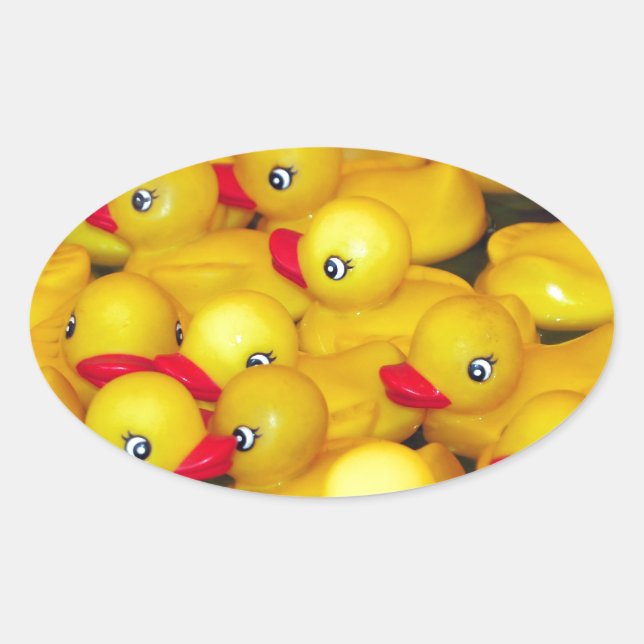 Cute yellow rubber duckies oval sticker (Front)