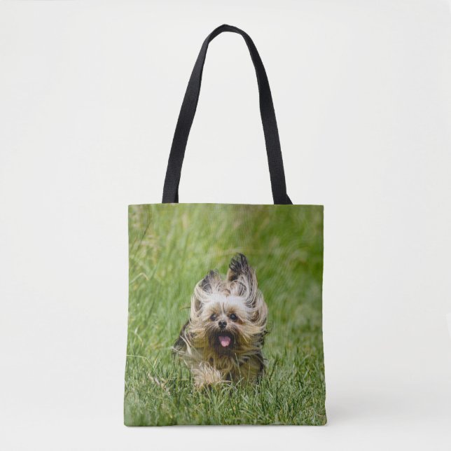 Cute Yorkshire Terrier Running Through Grass Tote Bag (Front)