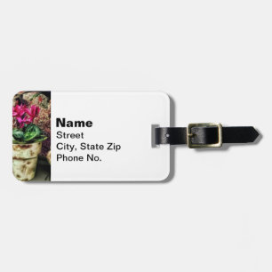 Cyclamen in Flowerpot and Ceramic Bird Luggage Tag