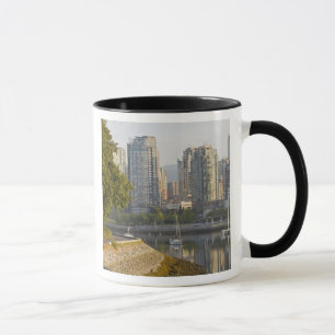 Cyclist along the Seawall Trail in downtown Mug