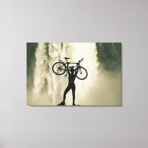 Cyclist in Front of Waterfall Canvas Print