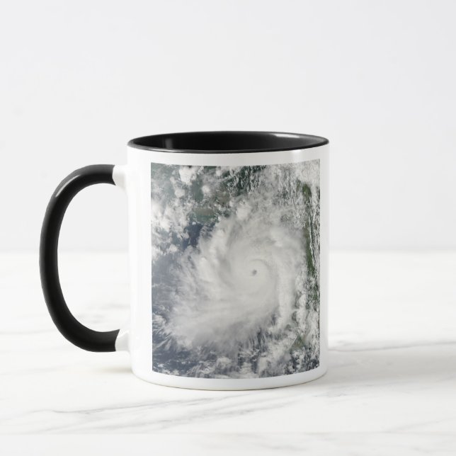 Cyclone Giri moves ashore over Burma Mug (Left)