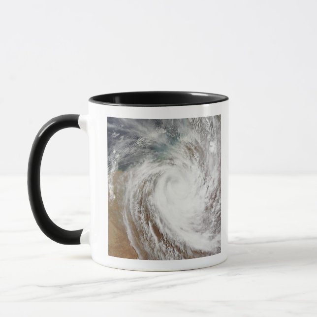 Cyclone Laurence moves far inland Mug (Left)