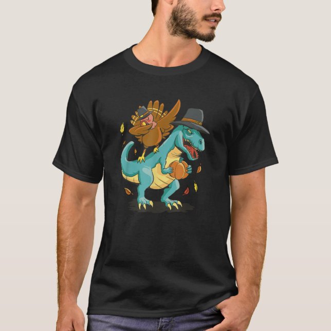 Dabbing Turkey On A Dinosaur Funny Thanksgiving T-Shirt (Front)