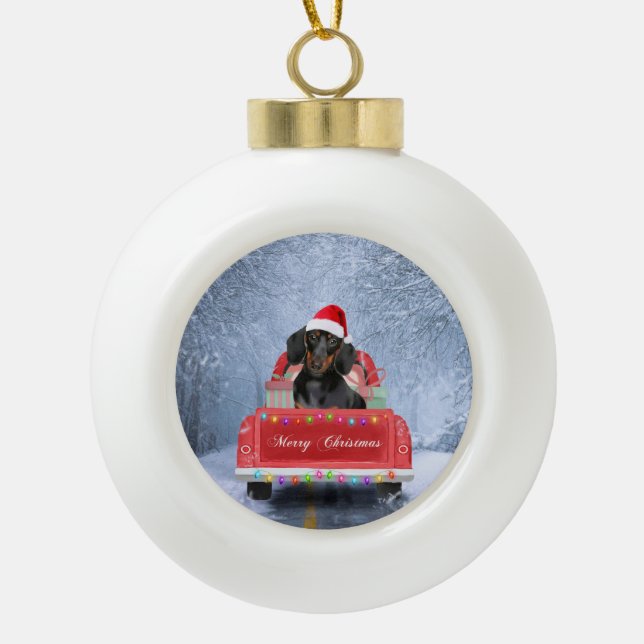 Dachshund Dog in Snow sitting in Christmas Truck  Ceramic Ball Christmas Ornament (Front)