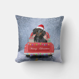 Dachshund Dog in Snow sitting in Christmas Truck Cushion