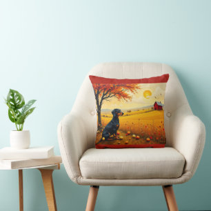 Dachshund on the farm at sunset cushion
