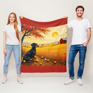 Dachshund on the farm at sunset fleece blanket