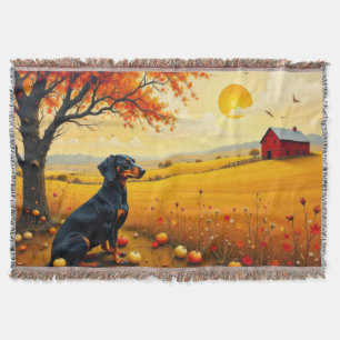 Dachshund on the farm at sunset throw blanket
