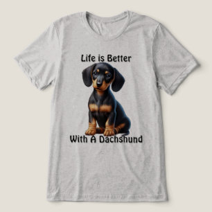 Dachshund Puppy Sitting and Looking with Innocent  Tri-Blend Shirt