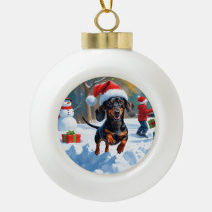 Dachshund Running in Snow with Christmas Hat Ceramic Ball Christmas Ornament
