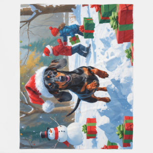 Dachshund Running in Snow with Christmas Hat Fleece Blanket