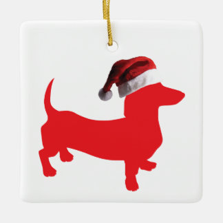 Dachshund wearing a Santa Claus hat for Christmas Ceramic Ornament