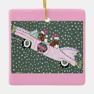 Dachshunds at Christmas in a pink convertible Ceramic Ornament
