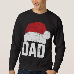 Dad with santa claus hat matching family christmas sweatshirt