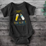 Daddy's drinking buddy baby bodysuit<br><div class="desc">Daddy's drinking buddy!
Design features hand drawn artwork of a glass of beer and a bottle of milk and the text "Daddy's drinkin' buddy</div>