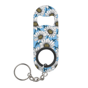 Daisies, wild flowers on blue