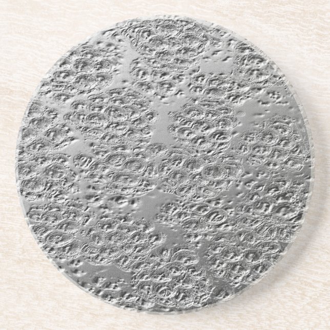 Damaged silver metal coaster (Front)