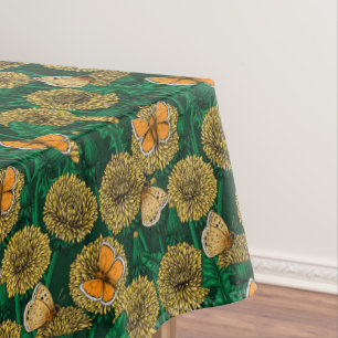 Dandelion meadow on dark green tablecloth