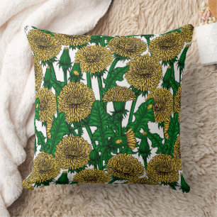 Dandelions on white cushion