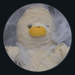 Danny Duck the Mummy  Classic Round Sticker<br><div class="desc">A fun design with Danny Duck dressed as a Mummy his favourite outfit for Halloween but also just for fun. Only in this costume does he feel at home in a room full of cobwebs and spiders before going on his scary adventures. You can see his Halloween video and many...</div>
