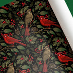 Dark and Moody Christmas Cardinals Wrapping Paper<br><div class="desc">Celebrate the holidays with this classy and moody Christmas design. This Christmas holiday wrapping paper features dark and moody colours with cardinal birds,  foliage,  and holly berries against a black background. Change the background colours and personalise it for your needs.</div>