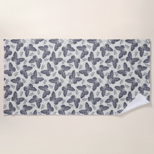 Dark blue butterfly pattern on grey background beach towel