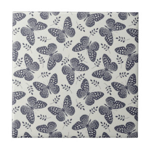 Dark blue butterfly pattern on grey background tile