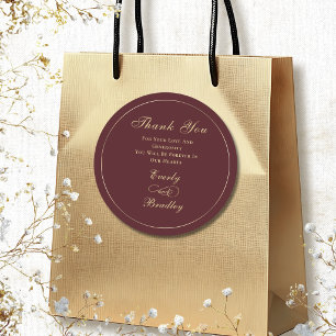Dark Burgundy Background Elegant Gold Script   Classic Round Sticker
