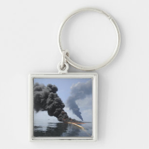 Dark clouds of smoke and fire emerge 3 key ring